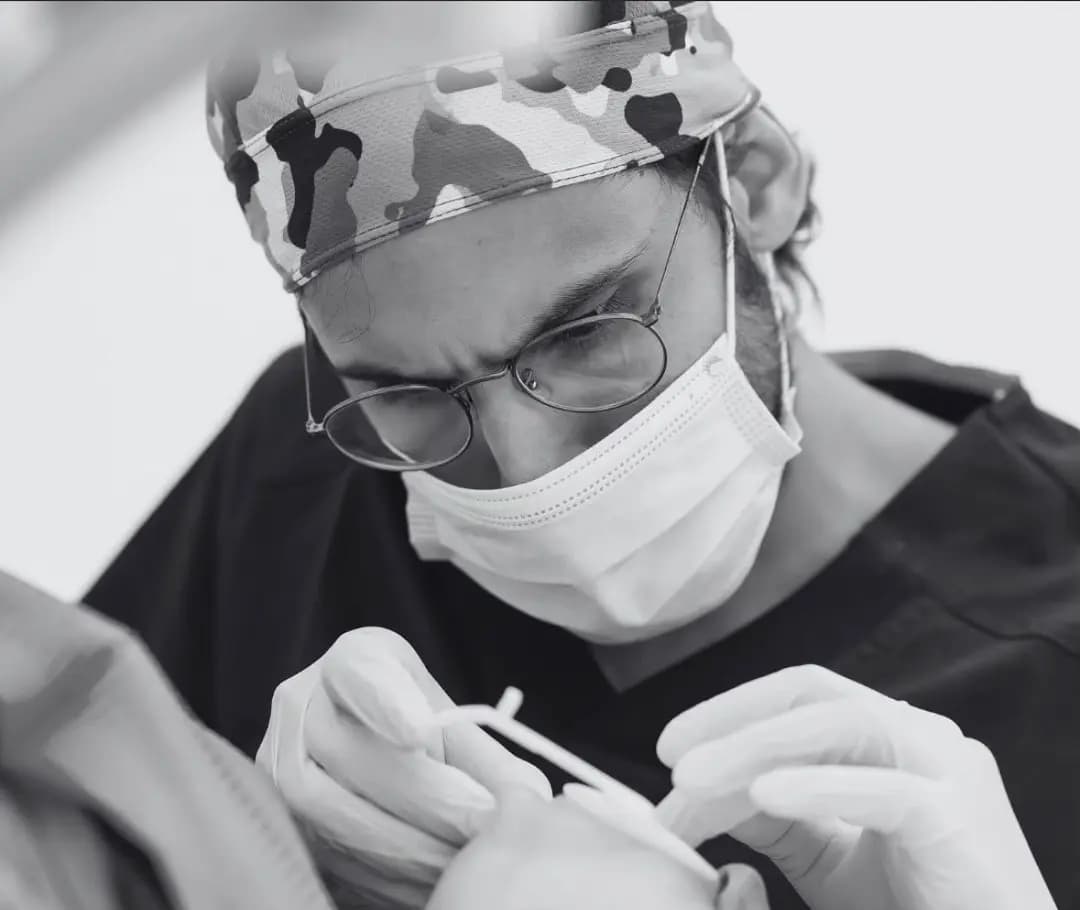 Perfect Smiles dentist focused during treatment